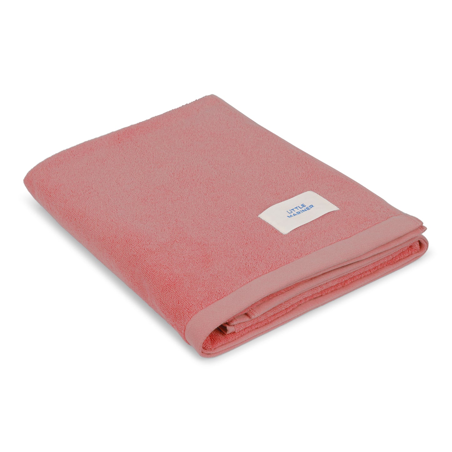 #Dusty Rose Folded dusty rose premium organic cotton terry towel by Little Mariner with branded label.