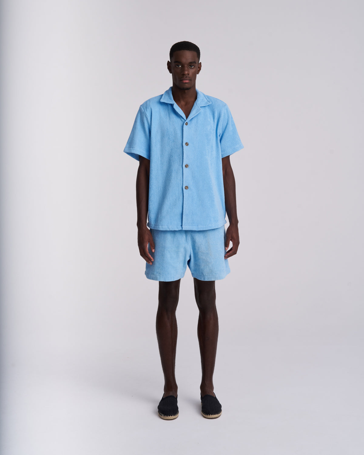 Coastal Blue men's terry camp-collar shirt styled with matching Coastal Blue terry shorts