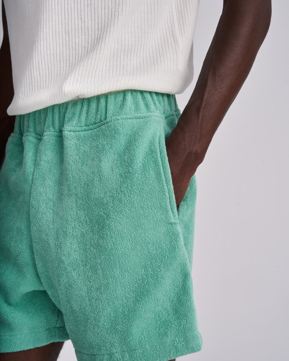 Sage Green men's organic cotton terry shorts with elasticated waistband and side pockets